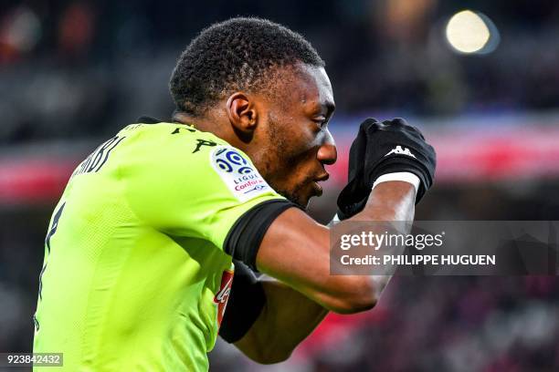Angers' Cameroun forward Karl Toko Ekambi celebrates after scoring a goal during the French L1 football match Lille vs Angers on February 24 2018 at...