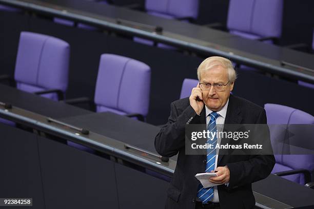 Economy Minister designate Rainer Bruederle of the German Free Democrats uses his phone at the first session of the new Bundestag on October 27, 2009...