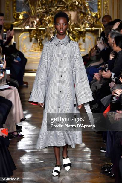 Model walks the runway at the Mila Schon show during Milan Fashion Week Fall/Winter 2018/19 on February 24, 2018 in Milan, Italy.