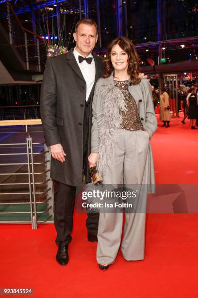 German actress Iris Berben and her partner Heiko Kiesow attend the closing ceremony during the 68th Berlinale International Film Festival Berlin at...