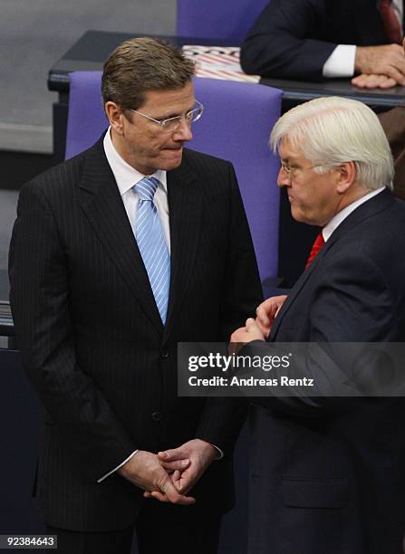 Chairman of the German Free Democrats and new German Vice Chancellor and Foreign Minister designate Guido Westerwelle and outgoing German Foreign...