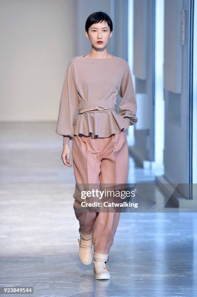 Model walks the runway at the Agnona Autumn Winter 2018 fashion show during Milan Fashion Week on February 24, 2018 in Milan, Italy.