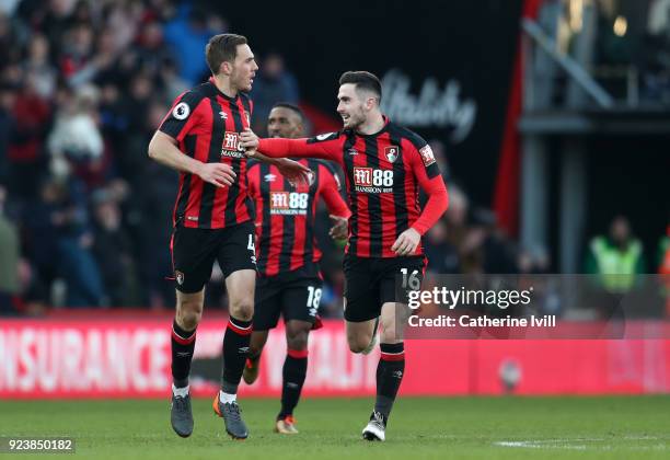 Dan Gosling of AFC Bournemouth celebrates scoring his teams second goal with Lewis Cook of AFC Bournemouth during the Premier League match between...