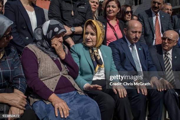 Party Chairman Meral Aksener , prays with family members of citizens and soldiers killed during Operation Olive Branch on February 24, 2018 in...