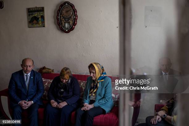 Party Chairman Meral Aksener prays with family members, who had recently lost a family member during Operation Olive Branch on February 24, 2018 in...