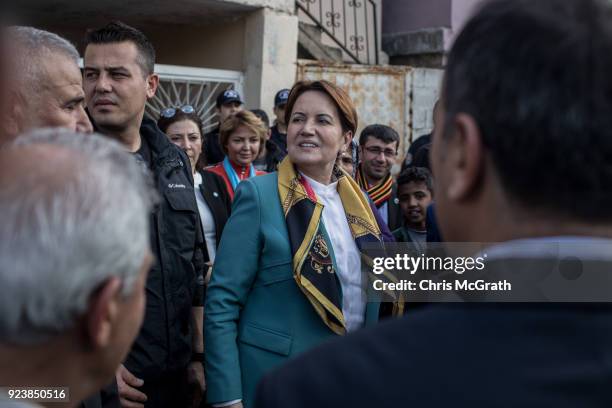 Party Chairman Meral Aksener leaves a house after visiting family members of citizens and soldiers killed during Operation Olive Branch on February...