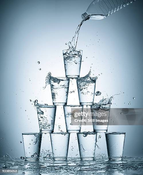 Splashing Water Glasses High-Res Stock Photo