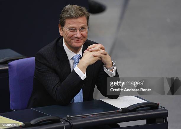 Chairman of the German Free Democrats and new German Vice Chancellor and Foreign Minister designate Guido Westerwelle attends the first session of...