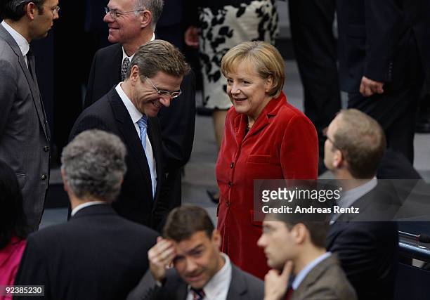 Chairman of the German Free Democrats and new German Vice Chancellor and Foreign Minister designate Guido Westerwelle and German Chancellor and...
