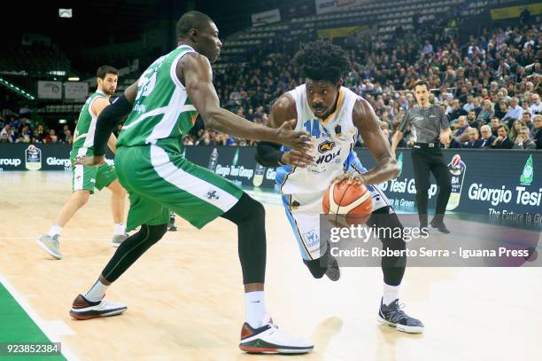 Henry Sims of Vanoli competes with Kyrylo Fesenko and Bruno Fitipaldo of Sidigas during the match quarter final of Coppa Italia between Scandone...