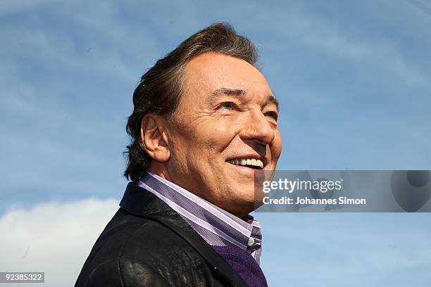Singer Karel Gott poses during a 'Christmas With Marianne And Michael' TV show taping photocall at Ellmauer Alm Sporthotel on October 27, 2009 in...