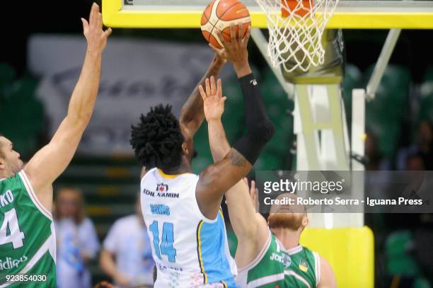 Henry Sims of Vanoli competes with Kyrylo Fesenko and Maarten Leunen of Sidigas during the match quarter final of Coppa Italia between Scandone...
