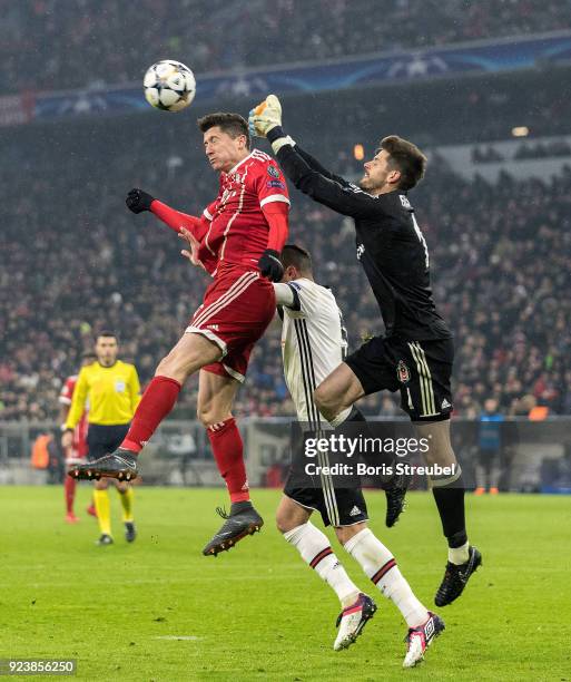 Goalkeeper Fabri of Besiktas Istanbul saves the ball against Robert Lewandowski of FC Bayern Muenchen during the UEFA Champions League Round of 16...