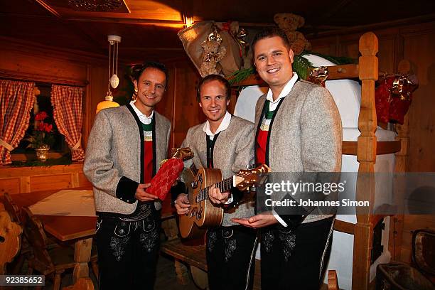 Musicians of the traditional Tyrolian band 'Die jungen Zillertaler' pose during a 'Christmas With Marianne And Michael' show taping photocall at...