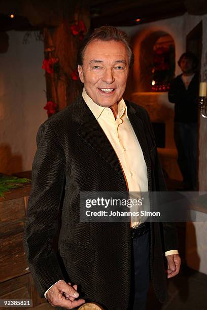 Singer Karel Gott poses during a 'Christmas With Marianne And Michael' TV show taping photocall at Ellmauer Alm Sporthotel on October 27, 2009 in...