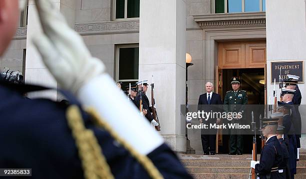 Secretary of Defense Robert M. Gates and the People's Republic of China Central Military Commission Vice Chairman Gen. Xu Caihou participate in a...