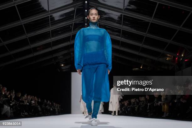 Model walks the runway at the Jil Sander show during Milan Fashion Week Fall/Winter 2018/19 on February 24, 2018 in Milan, Italy.