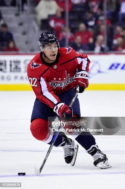 Madison Bowey of the Washington Capitals skates with the puck in the first period against the Tampa Bay Lightning at Capital One Arena on February...