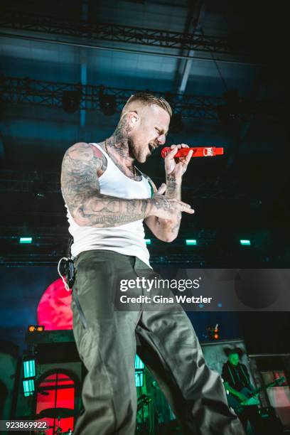 German rapper Maximilian Diehn aka Kontra K performs live on stage during a concert at the Max Schmeling Halle on February 24, 2018 in Berlin,...