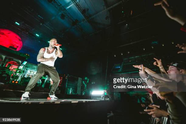 German rapper Maximilian Diehn aka Kontra K performs live on stage during a concert at the Max Schmeling Halle on February 24, 2018 in Berlin,...