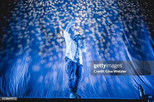 German rapper Rico Depeka performs live on stage in support of Kontra K during a concert at the Max Schmeling Halle on February 24, 2018 in Berlin,...