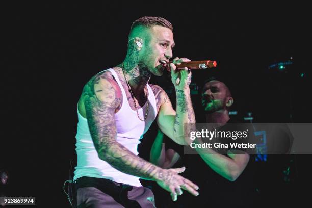 German rapper Maximilian Diehn aka Kontra K performs live on stage during a concert at the Max Schmeling Halle on February 24, 2018 in Berlin,...