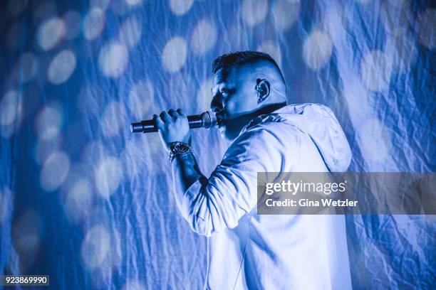 German rapper Rico Depeka performs live on stage in support of Kontra K during a concert at the Max Schmeling Halle on February 24, 2018 in Berlin,...