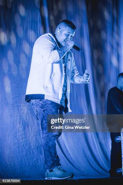 German rapper Rico Depeka performs live on stage in support of Kontra K during a concert at the Max Schmeling Halle on February 24, 2018 in Berlin,...