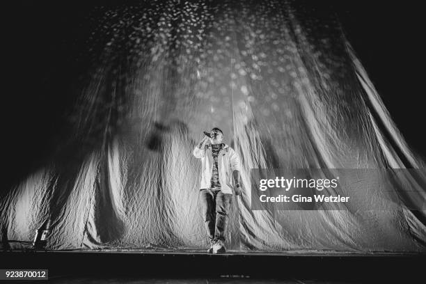 German rapper Rico Depeka performs live on stage in support of Kontra K during a concert at the Max Schmeling Halle on February 24, 2018 in Berlin,...