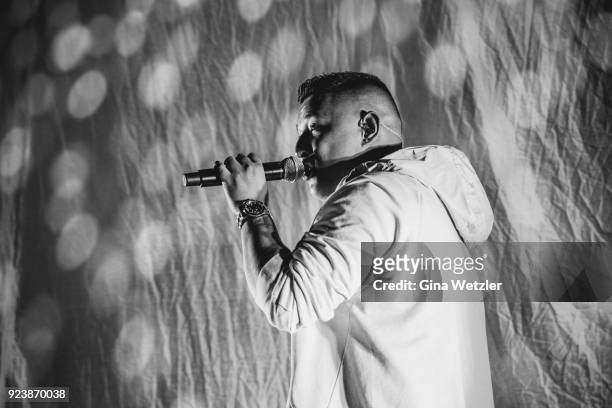 German rapper Rico Depeka performs live on stage in support of Kontra K during a concert at the Max Schmeling Halle on February 24, 2018 in Berlin,...