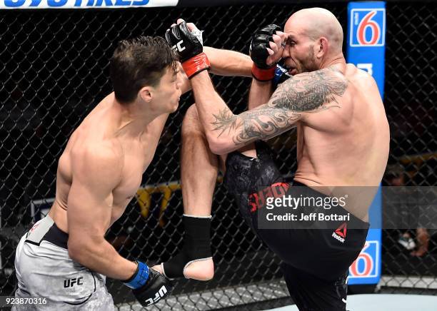 Alan Jouban punches Ben Saunders in their welterweight bout during the UFC Fight Night event at Amway Center on February 24, 2018 in Orlando, Florida.