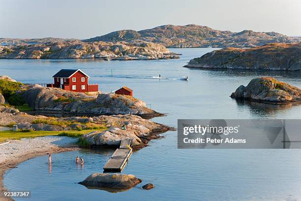 bathing in sea, sk?rhamn, tjorn, sweden - bohuslan stock pictures, royalty-free photos & images