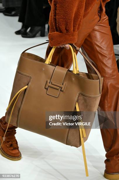 Model walks the runway at the Tod's Ready to Wear Fall/Winter 2018-2019 fashion show during Milan Fashion Week Fall/Winter 2018/19 on February 23,...