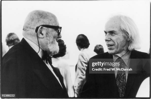 American photographers Ansel Adams and Minor White talk at an Edward Weston exhibition at the Museum of Modern Art, New York, New York, January 27,...