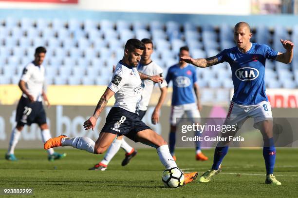 Feirense midfielder Tiago Silva from Portugal with CF Os Belenenses midfielder Andre Sousa from Portugal in action during the Primeira Liga match...