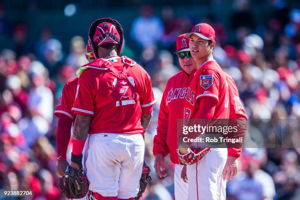 Shohei Ohtani pitcher of the Los Angeles Angels of Anaheim gets taken out of the game by manager Mike Scioscia in the second inning against the...