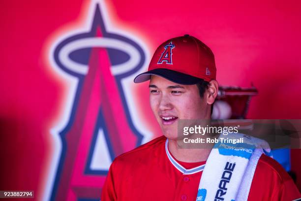 Shohei Ohtani pitcher of the Los Angeles Angels of Anaheim looks on before a game against the Milwaukee Brewers during a Spring Training Game at...