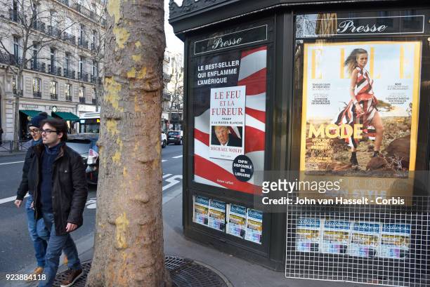 Newspaper kiosks advertise the French translation of Michael Wolff's book on Donald Trump Fire and Fury on February 23, 2018 in Paris, France. The...