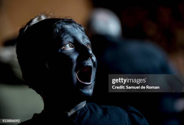 People sporting horns on their heads and grease on their faces perform as 'Diablos de Luzon' during the carnaval in Luzon, near Guadalajara, on...
