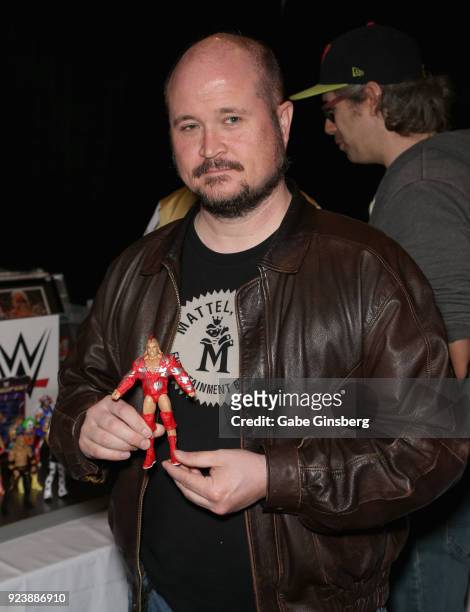 Mattel WWE designer Bill Miekina holds up a Red Rooster Elite Action Figure during Vegas Toy Con at the Circus Circus Las Vegas on February 24, 2018...