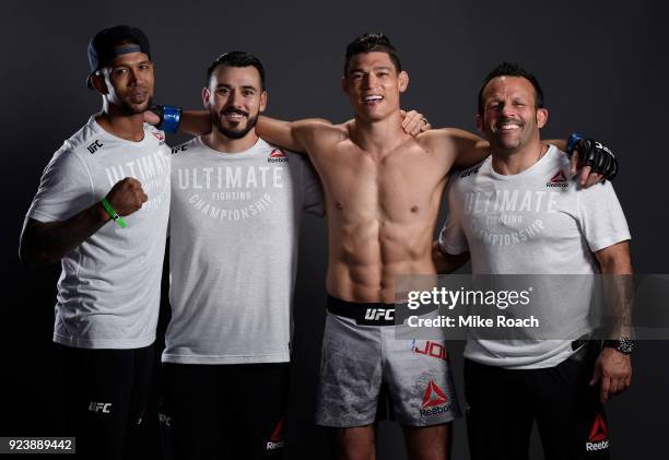 Alan Jouban poses for a portrait backstage with his team after his victory over Ben Saunders during the UFC Fight Night event at Amway Center on...