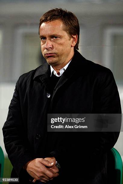 Manager Horst Heldt waits for the start of the DFB Cup match between SpVgg Greuther Fuerth and VfB Stuttgart at the Playmobil stadium on October 27,...