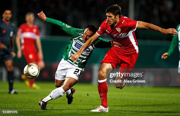 Marco Sailer of Greuther Fuerth is challenged by Matthieu Delpierre of Stuttgart during the DFB Cup match between SpVgg Greuther Fuerth and VfB...