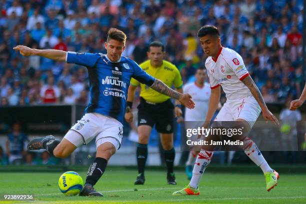 Everaldo Stum of Queretaro and Leonel Lopez of Toluca fight for the ball during the 9th round match between Queretaro and Toluca as part of the...