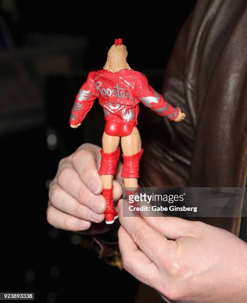 Mattel WWE designer Bill Miekina holds up a Red Rooster Elite Action Figure during Vegas Toy Con at the Circus Circus Las Vegas on February 24, 2018...