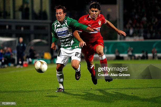 Marco Sailer of Greuther Fuerth is challenged by Serdar Tasci of Stuttgart during the DFB Cup match between SpVgg Greuther Fuerth and VfB Stuttgart...