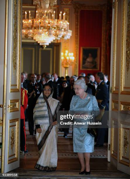 Queen Elizabeth ll and the President of India Pratibha Patil enter the White Drawing Room at Windsor Castle to view an exhibition of items at the...