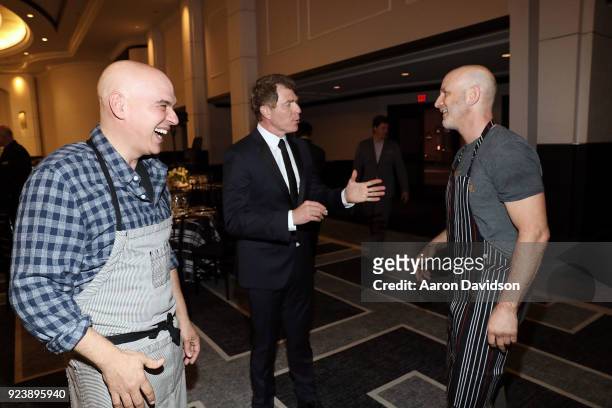 Michael Symon, Bobby Flay, and Marc Vetri attend Tribute Dinner on February 24, 2018 in Miami Beach, Florida.