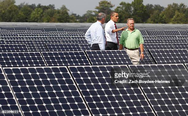 President Barack Obama, speaks with Florida Power and Light CEO Lewis Hay, and Construction Manager Greg Bove during a visit to the DeSoto Next...