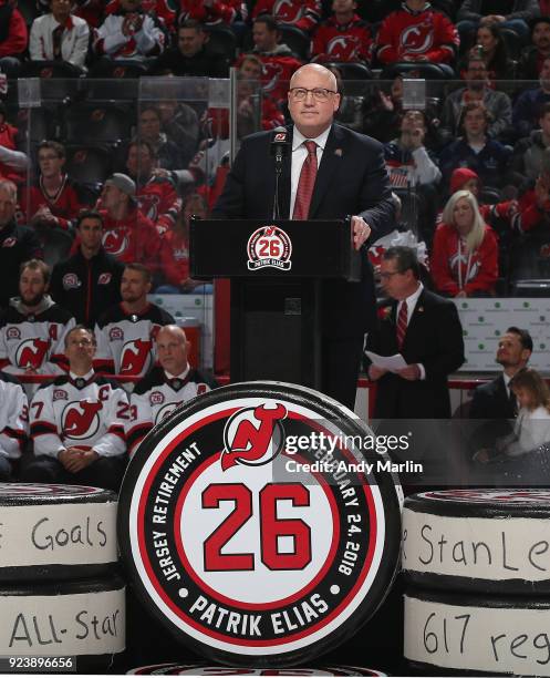 Deputy Commissioner Bill Daly addresses the fans during the ceremony to retire Patrik Elias' # 26 jersey prior to the game between the the New York...